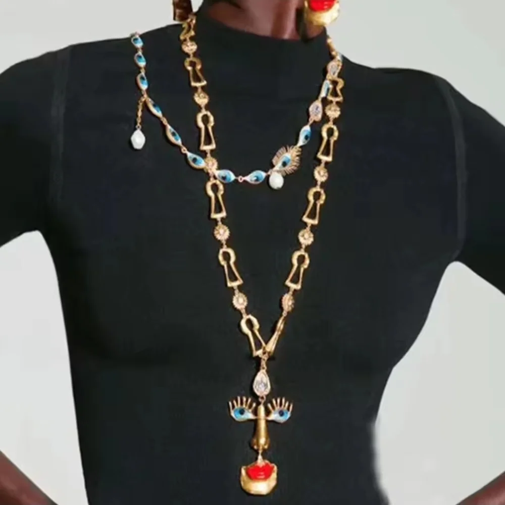 Gold-tone Abstract Face Pendant Necklace with Red Lips - Picture 4 of 5